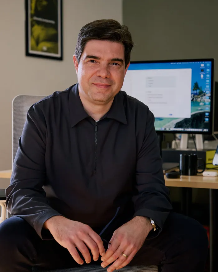 Bruno Genovese at his desk in London